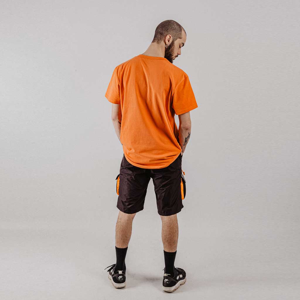 T-shirt con tasca mesh termo saldata sul petto